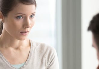 Irritated businesswoman holding paper, disagrees with bad contract terms, refuses to sign document, has questions claims to agreement conditions, boss dissatisfied with report or written work result